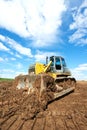 Track-type loader bulldozer excavator at work