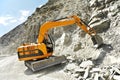 Track-type loader excavator at mountain work