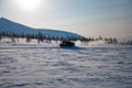 Tracked all-terrain vehicle in winter ladscape in Kamchatka Royalty Free Stock Photo