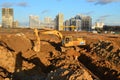 Tracked excavator KRANEKS working at a construction site. During laying or replacement of underground