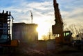 Tracked excavator with raised bucket. Royalty Free Stock Photo