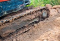 Tracked vehicle working in farm