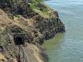 Tracks approach Railroad Tunnel 9 at the Columbia River Gorge near Lyle, Washington, USA Royalty Free Stock Photo