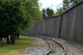 Tracks and floodwall Royalty Free Stock Photo