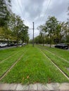 Tracks over Bilbao tramway garden on a cloudy day Royalty Free Stock Photo