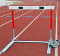 Trackshoes and hurdle