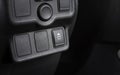 Traction control switch button and blank socket in car. Royalty Free Stock Photo