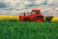 Tractor in the agricultural fields Royalty Free Stock Photo