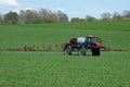 Tractor with agricultural sprayer machine