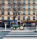 The tractor, the agriculture machine, a tractor in the Parisians street, manifestation of agricultor, Paris, France