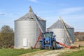 Tractor, Auger, and Grain Bins