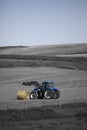 Tractor with Bail of Hay Royalty Free Stock Photo