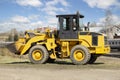 Tractor with bucket.The bulldozer is carrying out repair work.Construction works