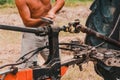 Tractor and cardan shaft for coupling equipment, tractor in the field during haymaking Royalty Free Stock Photo