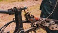 Tractor and cardan shaft for coupling equipment, tractor in the field during haymaking Royalty Free Stock Photo