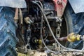 Tractor and cardan shaft for coupling equipment, tractor in the field during haymaking Royalty Free Stock Photo