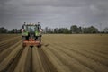 Tractor creating ridging in an English field.