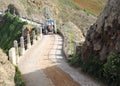 Tractor crossing La Coupee on Sark