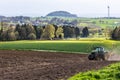 Beautiful spring landscape with green meadows, the sky with picturesque clouds Royalty Free Stock Photo