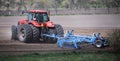 Tractor Cultivating the Earth: A Symphony of Farming