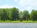 Tractor cutting grass, Lithuania