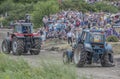 Tractor with a damaged wheel on the Bizon Track Show