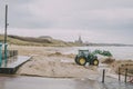 Tractor On A Winter Beach Royalty Free Stock Photo