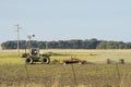Tractor dragging a harrow in field Royalty Free Stock Photo