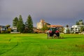Tractor Mowing Grass on Large Suburban Playing Field, Sydney, Australia