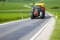 Tractor driving on the road