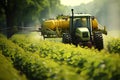 Tractor effectively spraying pesticides on vegetable field for crop protection and pest control