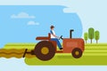 A man plowing an agricultural field using tractor