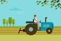 A farmer plowing an agricultural field using tractor