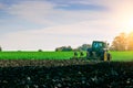 Tractor farm. Agriculture farm machinery on landscape land field. Farmer machine equipment for crop. Tractor farm fields