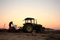 The tractor in farmland farming Royalty Free Stock Photo