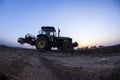 The tractor in farmland farming Royalty Free Stock Photo