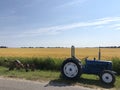 Tractor at farmland Royalty Free Stock Photo