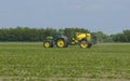 Tractor fertilizing field