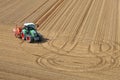 Tractor in aerial view in a field Royalty Free Stock Photo