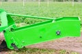 Tractor in the field with a plow for digging potatoes harvesting, seasonal work, fresh vegetables, agro-culture, farming, close-up Royalty Free Stock Photo