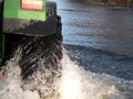 Tractor going by flood road