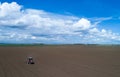 Tractor harrowing field