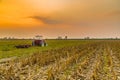 tractor and harvested land Royalty Free Stock Photo