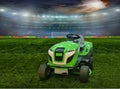 Tractor-lawn mower on a spacious Royalty Free Stock Photo