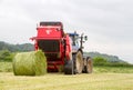 Tractor and lely baler Royalty Free Stock Photo