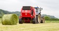 Tractor and lely baler Royalty Free Stock Photo