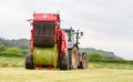 Tractor and lely baler Royalty Free Stock Photo