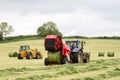 Tractor and lely baler Royalty Free Stock Photo