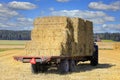 Tractor with Load of Straw Bales on Trailer Royalty Free Stock Photo