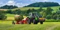 Tractor loading bales of hay